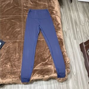 Woman’s size 6 Lululemon High-Rise Leggings in blue